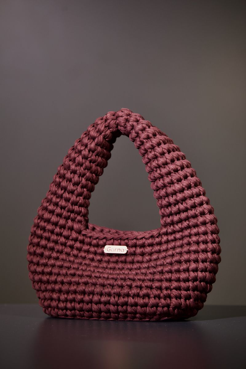 Blush pink fluffy mini bag with a single loop handle