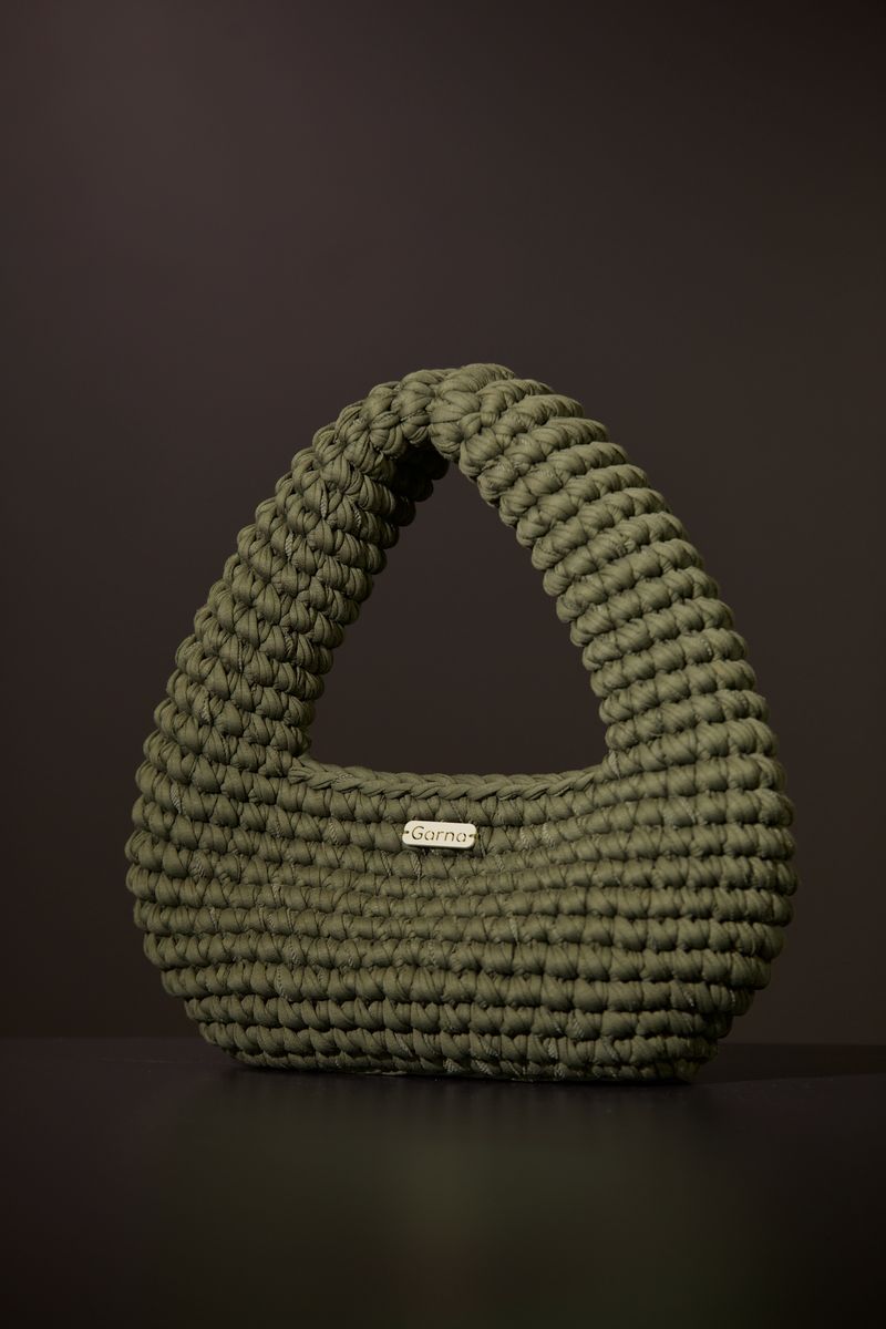 Olive green crochet mini bag with a single loop handle